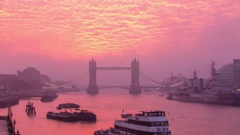 Vibrant altocumulus sunrise cloud above the River Thames in London.  Zoom out Stock Footage 166952920