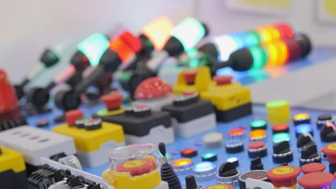A Vibrant and Colorful Control Panel Featuring Buttons, Lights, and Modern Stock Footage 287268026
