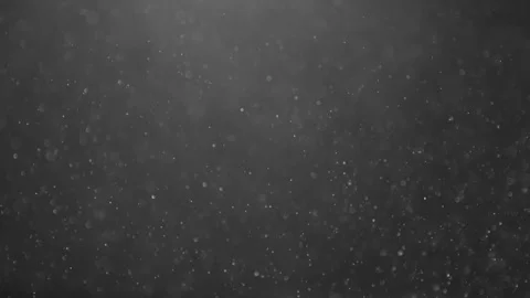 Vibrant and colorful dust bubble effect falling over a black background Stock-Footage 301896812