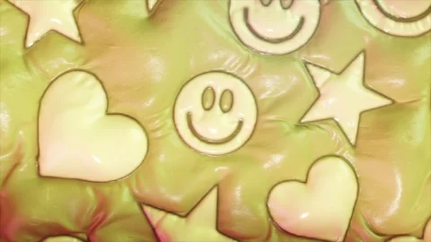 Vibrant animation showcasing inflated smiley faces, hearts, and stars on a Stock Footage 277529635