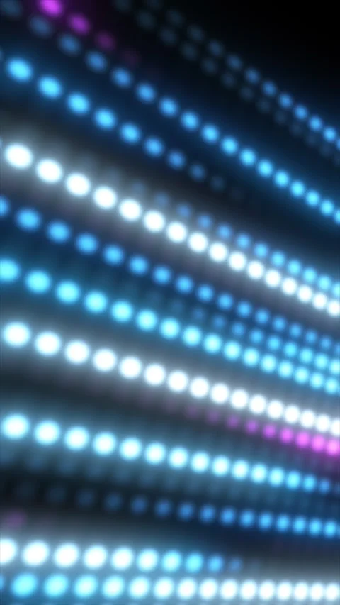 A vibrant array of blue and pink dots lined up in rows with a bokeh-like ef.. Stock Footage 316820960