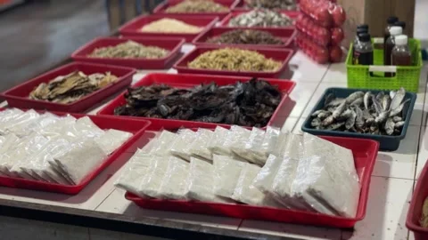 Vibrant array of diverse local provisions and culinary staples at a bustlin.. Stock Footage 337285146