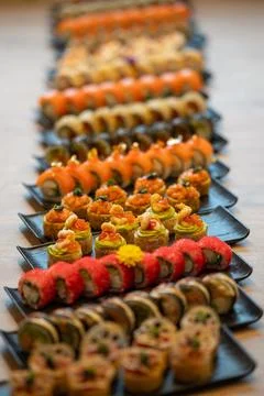 A vibrant array of many different types of gourmet sushi and maki rolls Stock Photos