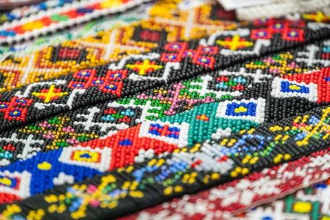 Vibrant beadwork pattern in bright primary and secondary colors, showcasing.. Stock Photos