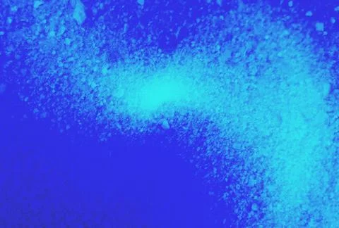Vibrant blue abstract gradient with a textured, speckled spray effect along.. イラスト素材