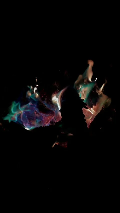 Vibrant blue and orange fire flames dancing in dark space for copy text Stock Footage 346558252