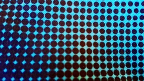Vibrant blue background featuring dark circular dots in geometric pattern Photos