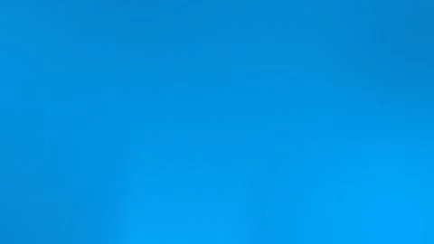 Vibrant blue gradient with subtle grid texture, seamless loop background. 4K. Stock Footage 309058977