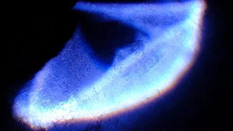 Vibrant blue light glows intensely with intricate icy patterns. Stock Footage 329372284