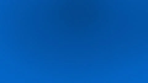 Vibrant blue seamless loop background in 4K. Solid color texture fills the Vídeo Stock 309701067