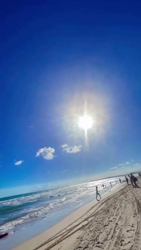 Vibrant Blue Sky Beach and Bright Sun Stock-Footage 341317324