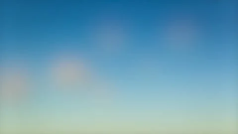 Vibrant blue sky filled with soft, scattered clouds. Vidéo 334656301