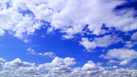 Vibrant Blue Sky with Fluffy Clouds 動画素材 315580220