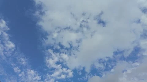 Vibrant Blue Sky with Fluffy White Clouds over Okinawa | 4K Stock Footage 297634541