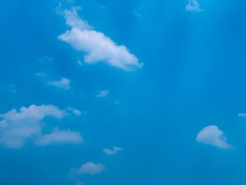 Vibrant Blue Sky with Scattered White Clouds Jakarta Indonesia Stock Photos