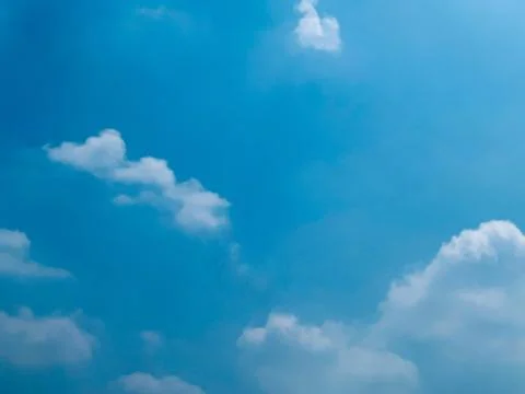 Vibrant Blue Sky with Scattered White Clouds Jakarta Indonesia Stock Photos