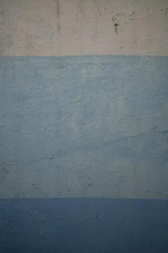 Vibrant blue wall texture: A captivating textured surface in striking blue,.. Stock Photos