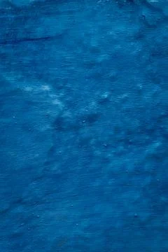 Vibrant blue wall texture: A captivating textured surface in striking blue,.. Stock Photos
