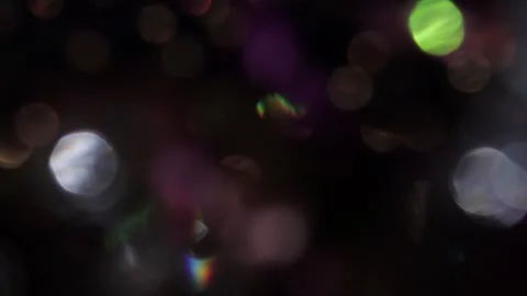 Vibrant bokeh with subtle flares of dark ordinary lights Stock Footage 317456313