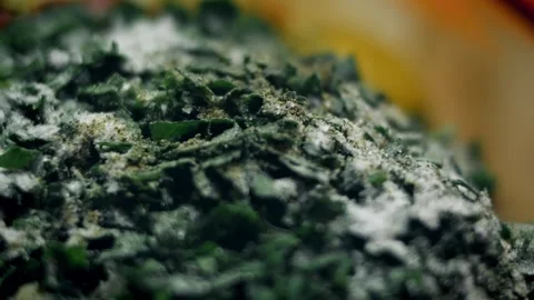 Vibrant bread crumbs scattered over seasoned minced meat in top view, 4K Stock Footage 341112360