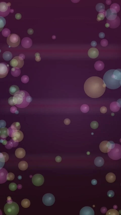 Vibrant bubbles gently rise against a soft, blurred background Stock Footage 327941567