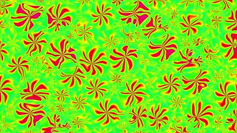 Vibrant candy swirls float against a neon green background Vídeos de archivo 345421103