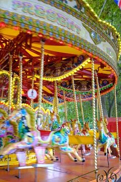Vibrant Carousel in Motion at a Funfair Stock Photos