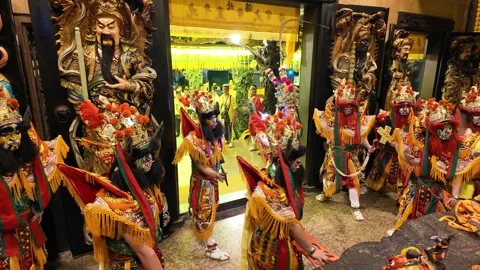 A vibrant Chinese procession temple event of Guan Jiang Shou Видео 315684947