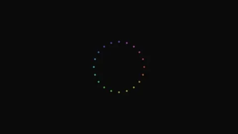 A vibrant circle of glowing multicolored dots set against a deep black back.. Stock Footage 339616636