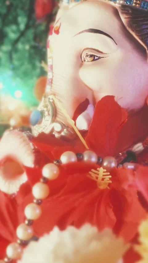A vibrant close-up of a Ganesha idol features intricate details Видео 320346157
