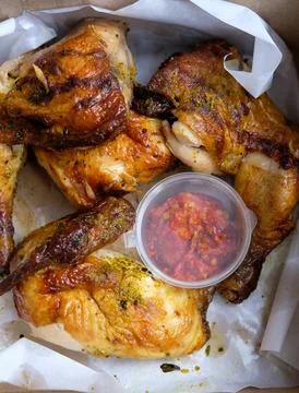 A vibrant close-up of Middle Eastern grilled chicken Stock Photos