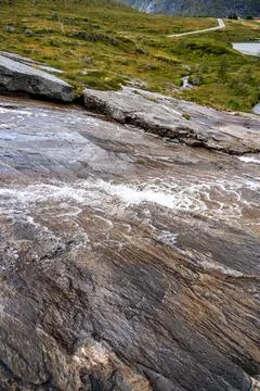 A vibrant close-up of a spirited mountain stream or small waterfall, graceful Stock Photos