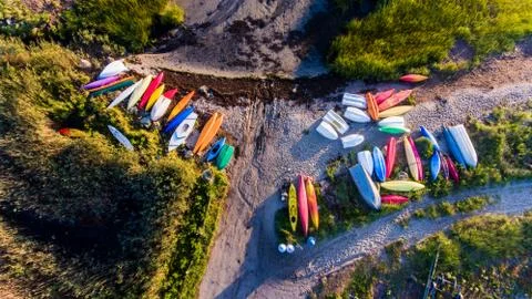 Vibrant Colored Canoes Stock Photos