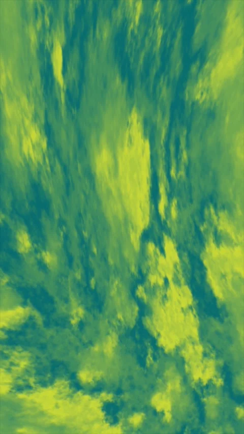 Vibrant colors fill the sky as clouds move gracefully over a tranquil lake Stock Footage 311804665