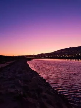 The vibrant colors reflection on river in bottom of the city Stock Photos