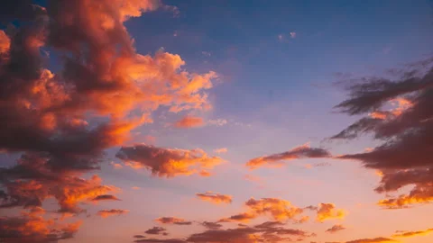 Vibrant colors sunrise Sky With Fluffy Clouds. morning Sky Background Dramatic Stock Footage 252182335