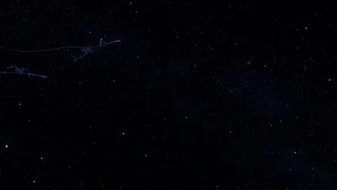 Vibrant comets flys leaving a bright shining trail through a lots of snowflakes Stock Footage 261728234