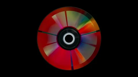 Vibrant compact disc is rotating with multicolored reflections, isolated on.. Stock Footage 306732420