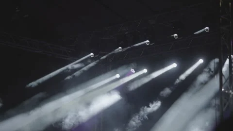 A vibrant concert stage featuring a dynamic display of colorful and bright li Stock Footage 310333888