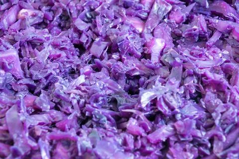 Vibrant cooked purple cabbage texture background closeup Stock Photos