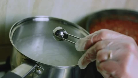 Vibrant culinary study of steaming rice ready for serving Stock Footage 342153454