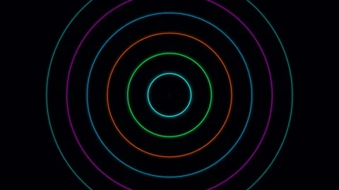 A vibrant cyan glowing ring centered against a deep black background field Video stock 335117609