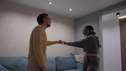 Vibrant dance interaction unfolds between two close friends Stock Footage 310411206