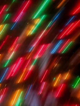Vibrant Diagonal Light Streaks Creating an Abstract Christmas Neon Pattern Stock-Fotos