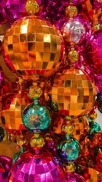 Vibrant disco ball ornaments create a festive, shiny background perfect for.. Stock Photos