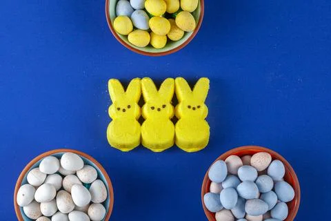 Vibrant easter concept with bunnies and eggs Stock Photos