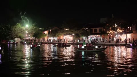 A vibrant evening scene along the river in Hoi An, Vietnam Stock Footage 326209198