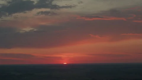Vibrant evening sunset sky over fields horizon with dramatic clouds Stock Footage 317166824