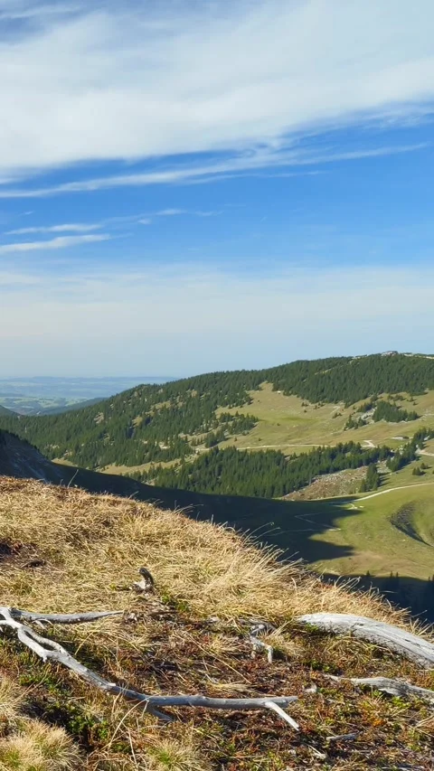 Vibrant Fall Colors and Rolling Hills in the Peaceful Enge Valley, Set Agains Stock Footage 308878870