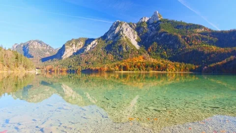 Vibrant fall landscape and mirror-like lake surface in the Allgu region showc Stock Footage 309093358